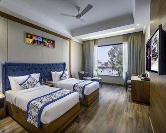 Lords Inn Chandigarh Zirakpur - Zerakpur - Slaapkamer