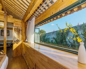 Tangdi Hotel - Dali - Stue