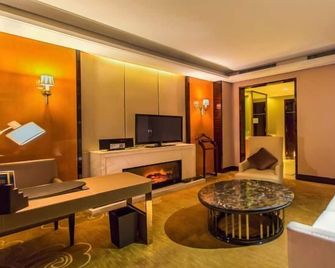 Xindao International Hotel Yichang - Yichang - Wohnzimmer