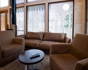 Holiday Houses Saimaa Gardens - Rauha - Oleskelutila