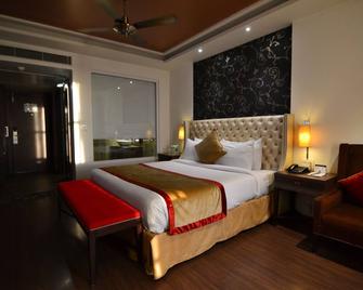 Indraprastha Spa Resort - דרמאסאלה - חדר שינה