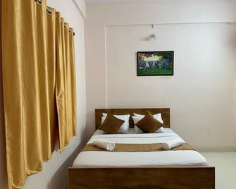 Vbh Inn- Affordable and Budget Friendly - Chandapura - Bedroom
