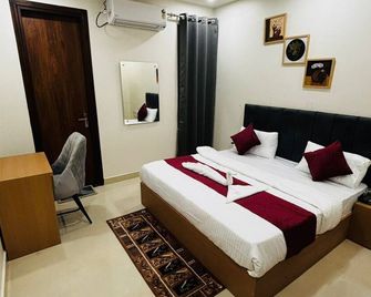 Nirvana inn - Prayagraj - Bedroom