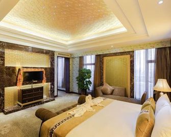 Zhuhai Xizang Hotel - ג'וחאי - חדר שינה