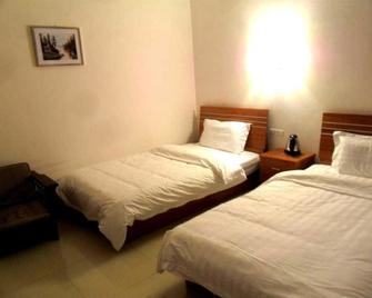 Huashan Gehui Hotel - Weinan - Habitación