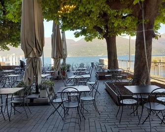 Marco Apartment - Holiday Apartment Luino - Luino - Restaurant