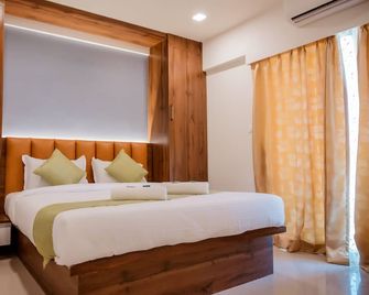 Hotel Heraa International - Mangalúru - Ložnice