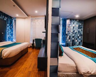 هوتل تركواز - تشانديغاره - غرفة نوم