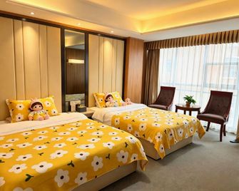 Xinshidai Holiday Hotel - Yichang - Schlafzimmer
