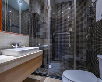 Hongcui Garden Hotel (Linyi Taisheng Plaza Branch) - Linyi - Bedroom