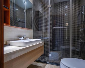 Hongcui Garden Hotel (Linyi Taisheng Plaza Branch) - Linyi - Schlafzimmer
