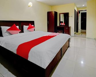 OYO 90331 Hotel Toba Shanda - Parapat - Schlafzimmer