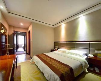 Wutaishan Golden Lotus Hotel - Xinzhou - Schlafzimmer