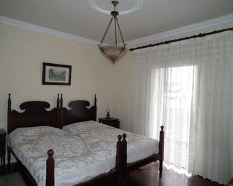 A Casa do Caseiro - פונשל - חדר שינה