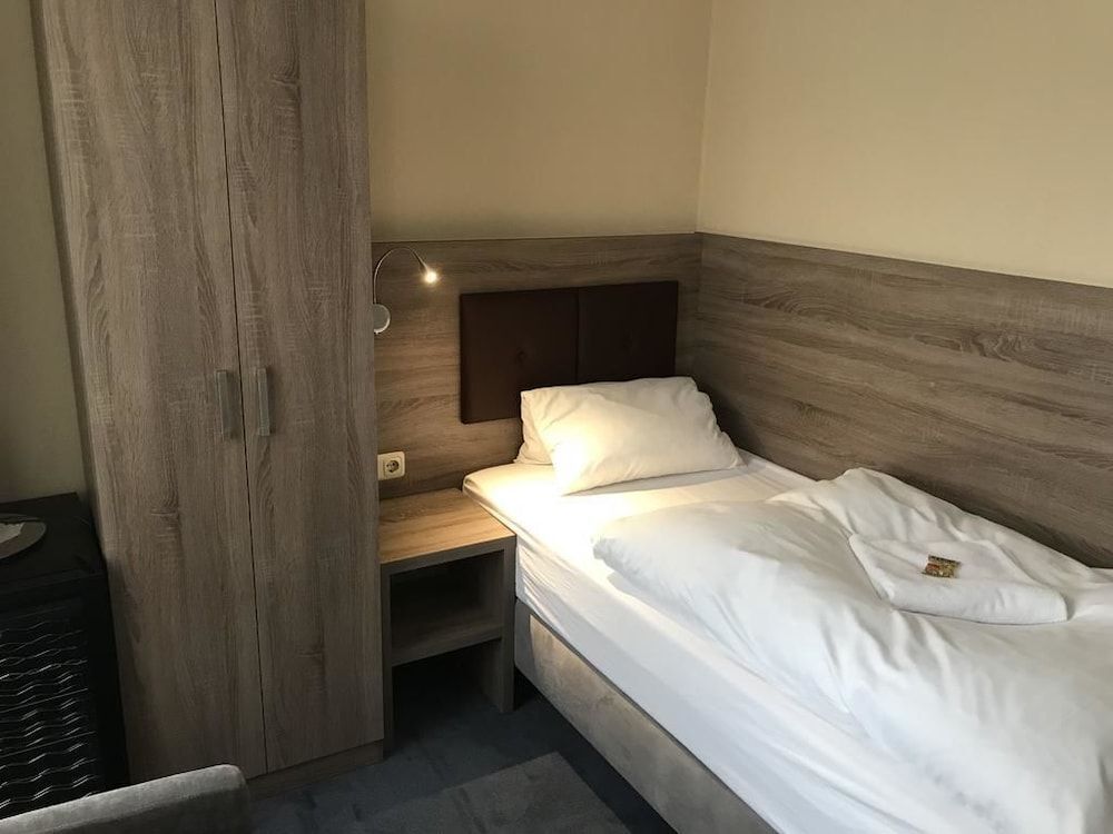 Hotel Junkerhaus - באד זלצופלן - חדר שינה