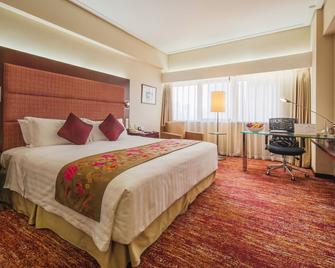 Dalian Grand Continent International Hotel - דאליין - חדר שינה