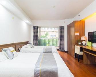 Xianglishe Apartment Hotel - Qingdao - Bedroom