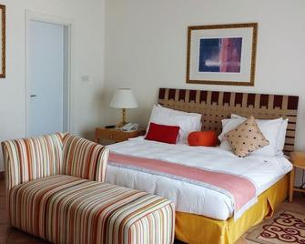 Seashell Julaia Hotel and Resort - Fahaheel - Schlafzimmer