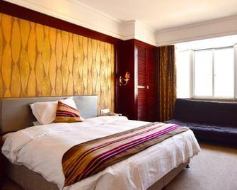 Mount Huangshan Lily Hotel - הואנגשאן - חדר שינה