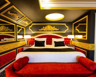 Andalouse Elegante Suite Hotel - แทรปซอน - ห้องนอน