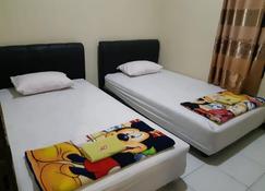 King Plaza Homestay - Tanjung Redeb - Bedroom