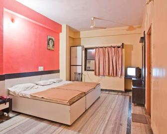 Hotel Kaustubh Shirdi - Shirdi - Phòng ngủ