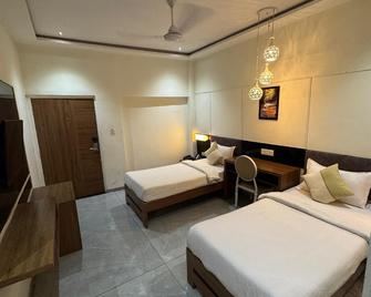 Santu Gsm An Eco Resort - Bhavnagar - Camera da letto