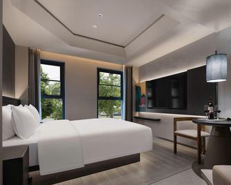 Changsha Exotic Impression V Hotel (Wuyi Square Ifs International Finance Center Branch) - Changsha - Habitación