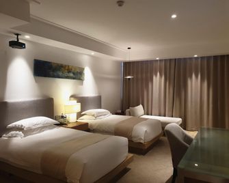 Tang's Hotel - Changde - Camera da letto