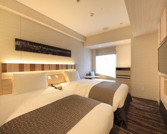 Hotel Sunroute Ginza - Tokyo - Bedroom