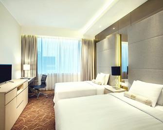 Menara Peninsula Hotel - Jakarta - Bedroom