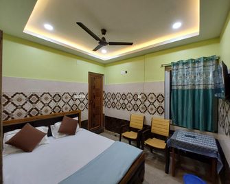 Sk Residency - Puri - Schlafzimmer