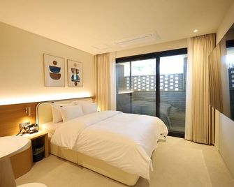 제천 에이치에비뉴 제천역점 - 제천 - 침실