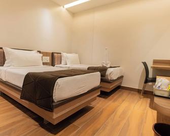 beestay Hotels Rajahmundry - Rājahmundry - Bedroom
