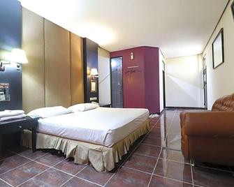 C'One Pulomas Hotel - Yakarta - Habitación
