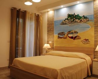 B&B My Sicily - ג'יארדיני נאקסוס - חדר שינה