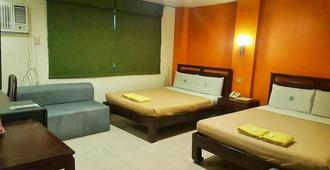 City Corporate Inn - Iloilo City - Bedroom