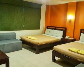 سيتي كوربرت إن - إيلويلو ستي - غرفة نوم