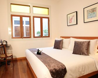 Gingerflower Boutique Hotel - Malakka - Schlafzimmer