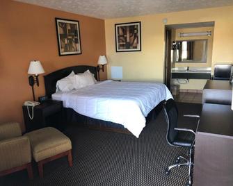 Nendels Inn & Suites Dodge City Airport - Додж-Сіті - Спальня