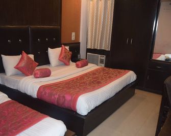 特里胡爾飯店 - 哈里瓦 - 臥室