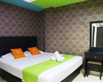 Seungit Syariah Inn Tebet Mitra RedDoorz - Jakarta - Habitació