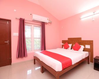 OYO 29325 Yajna Comforts - Madikeri - Habitación