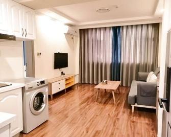 Hua Bin Hotel - Binzhou - Sala de estar