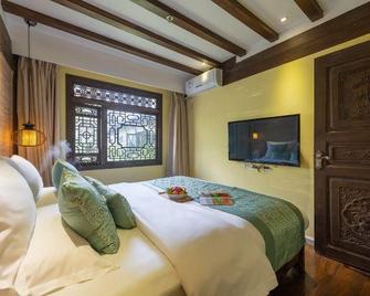 Lijiang Guiyuantianju Inn Branch1 - Lijiang - Bedroom