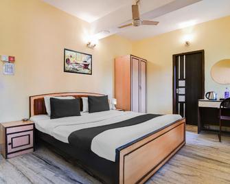 Super Hotel O Alipore Near Chetla - Kolkata - Bedroom