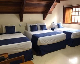 Summit Suites Hotel Campos do Jordao - קמפוס דו ג'ורדאו - חדר שינה