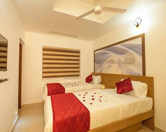 Hotel Eden Palace - Thrissur - Habitación