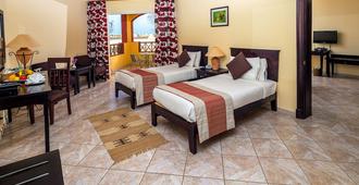 Royal Tulip Beach Resort - Port el Ghalib - Schlafzimmer