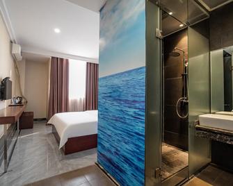 Xinshanghui Hotel - Yulin - Habitación